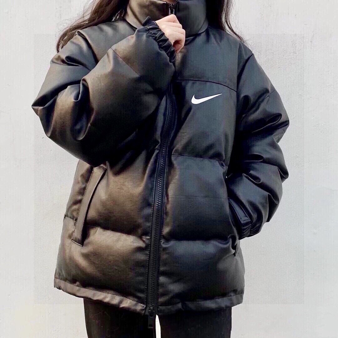 Nike/耐克皮质羽绒棉服手塞棉面包情侣款 INS网红自留款   面包服蓬蓬样式  皮质面料的防水防风炒鸡暖和  细腻纹理的皮料不仅手感柔软 且质感十